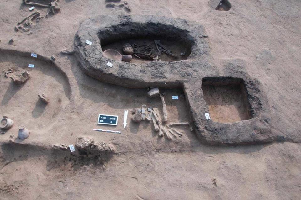 This undated handout photo provided by the Egyptian Antiquities Authority, shows a burial site dating back to the Predynastic Period in Kom al-Kholgan archaeological site, about 140 kilometers (87 miles) north of Cairo. The Antiquities Ministry said Wednesday, Jan. 23, 2019 that archaeologists have uncovered ancient tombs dating back to the Second Intermediate Period, 1782-1570 B.C., in the Nile Delta. (Egyptian Antiquities Authority via AP)