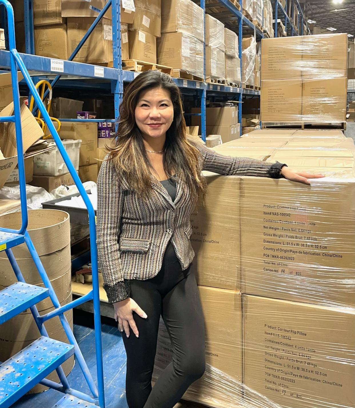 Pauline Peng Skinner, who runs a small wholesale business in Richmond Hill, Ont., says her bank told her in early December that she isn't eligible for the CEBA loan she received. (Submitted by Pauline Peng Skinner - image credit)