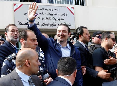 Lebanon's former Prime Minister Saad al-Hariri greets his supporters after casting his ballot at a polling station during Beirut's municipal elections, Lebanon, May 8, 2016. REUTERS/Mohamed Azakir