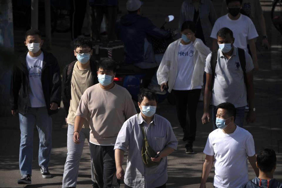 China is bracing for a new wave of Covid-19 infections that could see as many as 65 million cases per week by the time the surge peaks at the end of June.
 (Mark Schiefelbein / AP)