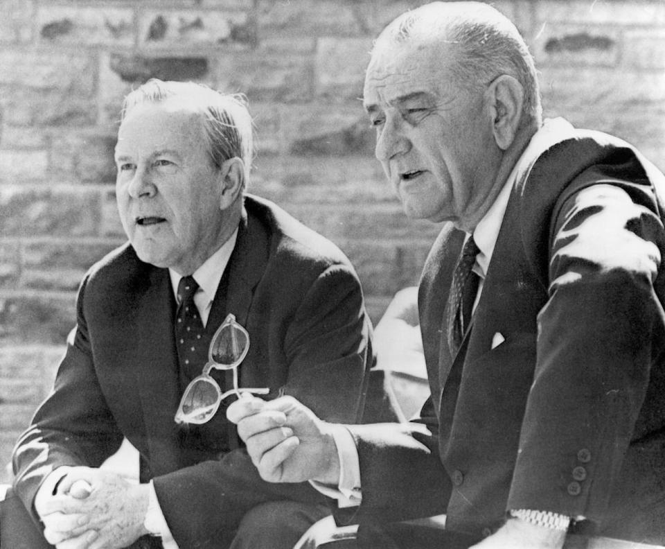 Prime Minister Lester B. Pearson (left) and President Lyndon B. Johnson talk with the media at Camp David in Thurmont, Maryland on April 3, 1965. 