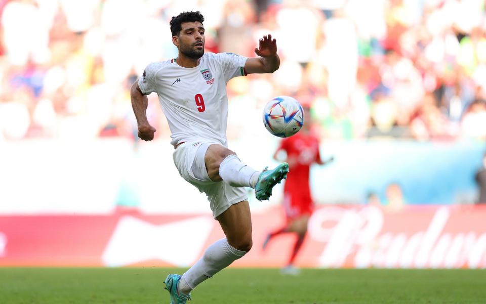 Mehdi Taremi of IR Iran in action during the FIFA World Cup Qatar 2022 Group B match between Wales and IR Iran at Ahmad Bin Ali Stadium - Fifa