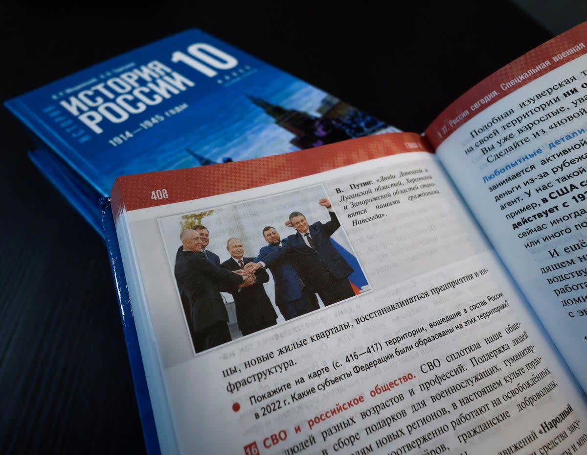 The textbook is also intended to convince children that Russia has ‘always been surrounded by enemies’ (Reuters)