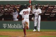 Boston Red Sox's Alex Verdugo (99) celebrates his solo home run during the eighth inning of a baseball game against the Toronto Blue Jays, Friday, Aug. 7, 2020, in Boston. (AP Photo/Michael Dwyer)