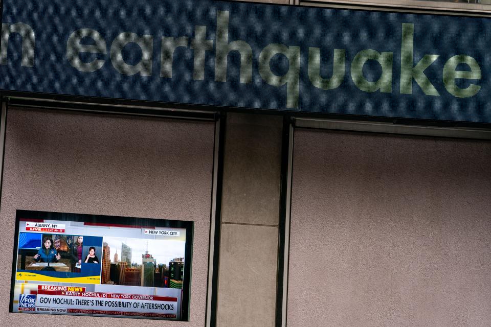 A television screen at News Corp Headquarters displays the breaking news of a 4.8 magnitude earthquake on April 5, 2024 in New York City. There were no reported injuries in the late morning earthquake, but many people reported visible shaking in buildings and homes.