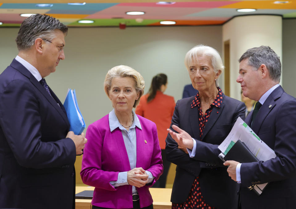 From left, Croatia's Prime Minister Andrej Plenkovic, European Commission President Ursula von der Leyen, European Central Bank President Christine Lagarde and Ireland's Finance Minister Paschal Donohoe during a round table meeting at an EU summit in Brussels, Friday, June 24, 2022. EU leaders were set to discuss economic topics at their summit in Brussels Friday amid inflation, high energy prices and a cost of living crisis. (AP Photo/Olivier Matthys)