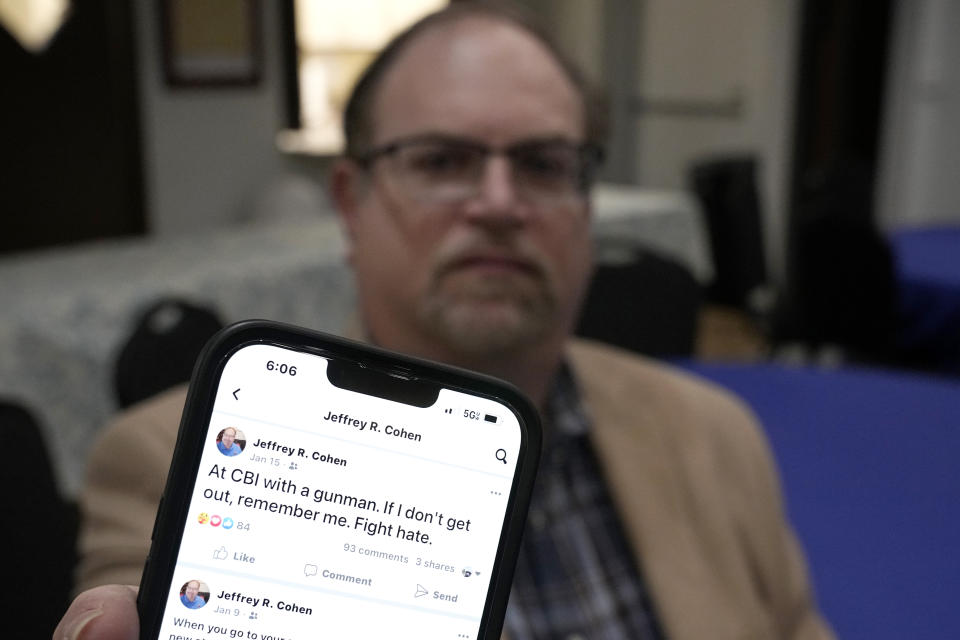 In this Dec. 22, 2022, photo, Jeff Cohen shows a Facebook posting he wrote shortly after being taken hostage at Congregation Beth Israel in Colleyville, Texas. A year ago, a rabbi and three others survived a hostage standoff at their synagogue in Colleyville, Texas. Their trauma did not disappear, though, with the FBI's killing of the pistol-wielding captor. Healing from the Jan. 15, 2022, ordeal is ongoing. (AP Photo/Tony Gutierrez)