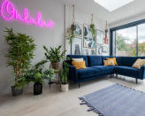 <p> There&apos;s something a little rock and roll about neon signage. In a small living room, it can show off your eccentric personality &#x2013; without taking up any valuable floor space.&#xA0; </p> <p> And, as a living room corner idea, with this compact blue sofa from Snug, it can instantly turn this multifunctional space into a place to entertain. So whether you choose a shop-bought sign, or go bespoke, you can really show off a fun and playful side to your interior style. </p>