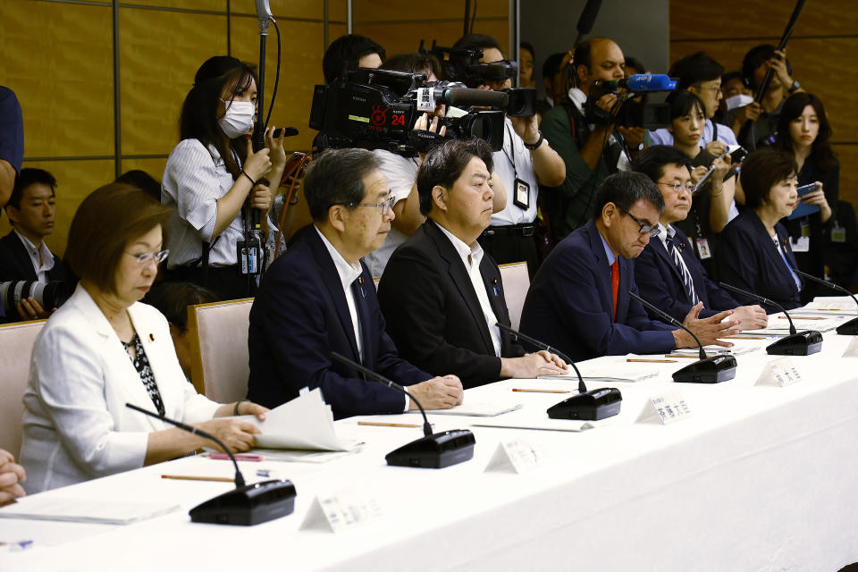 Japanese Foreign Minister Yoshimasa Hayashi, center, attends a meeting with representatives of the Inter-Ministerial Council for Contaminated Water, Treated Water and Decommissioning Issues and the Inter-Ministerial Council Concerning the Continuous Implementation of the Basic Policy on Handling of Advanced Liquid Processing System (ALPS) Treated Water, at the prime minister's office in Tokyo Tuesday, Aug. 22, 2023. (Rodrigo Reyes Marin/Pool Photo via AP)