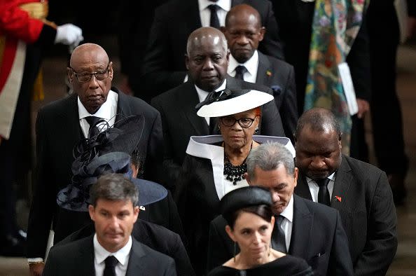 LONDON, ENGLAND - SEPTEMBER 19: Tanzania's President Samia Suluhu Hassan, center, walks with other dignitaries as the coffin of Queen Elizabeth II is carried out of Westminster Abbey during her State Funeral on September 19, 2022 in London, England. (Photo Frank Augstein - WPA Pool)