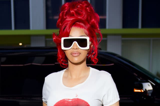 Cardi B shows off fiery new red pixie hairstyle while rapping