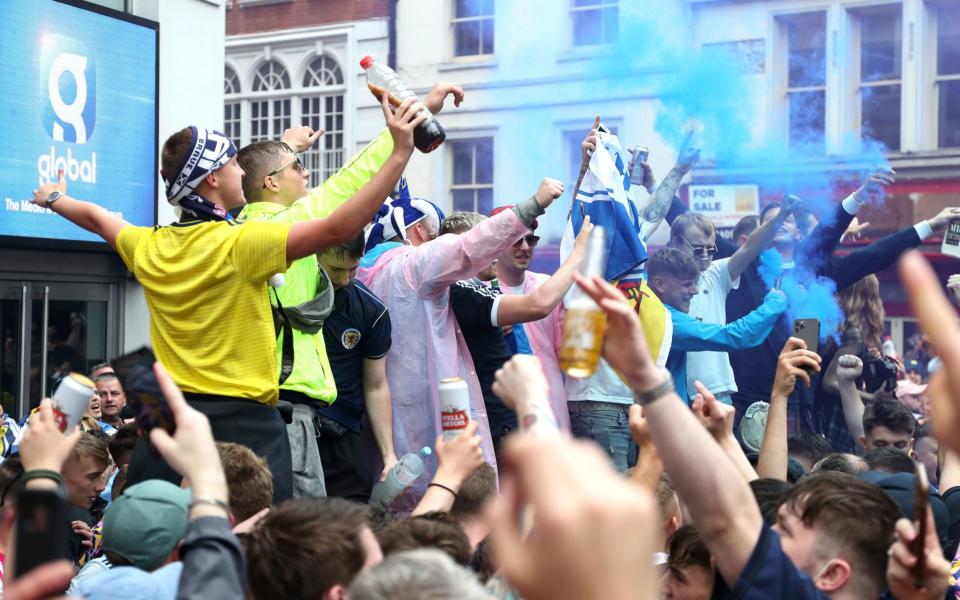 Scotland fans gather in Leicester Square before the UEFA Euro 2020 match between England and Scotland later tonight.  - Kieran Cleeves/PA Wire