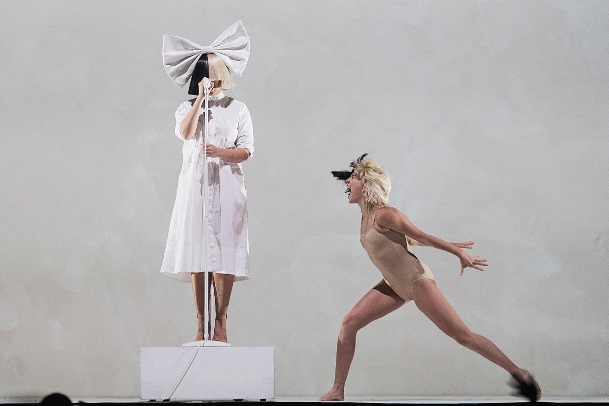 Sia and Maddie Ziegler perform on stage during the opening night of her 'Nostalgic for the Present' tour at KeyArena on September 29, 2016 in Seattle, Washington. (Photo: Mat Hayward via Getty Images)