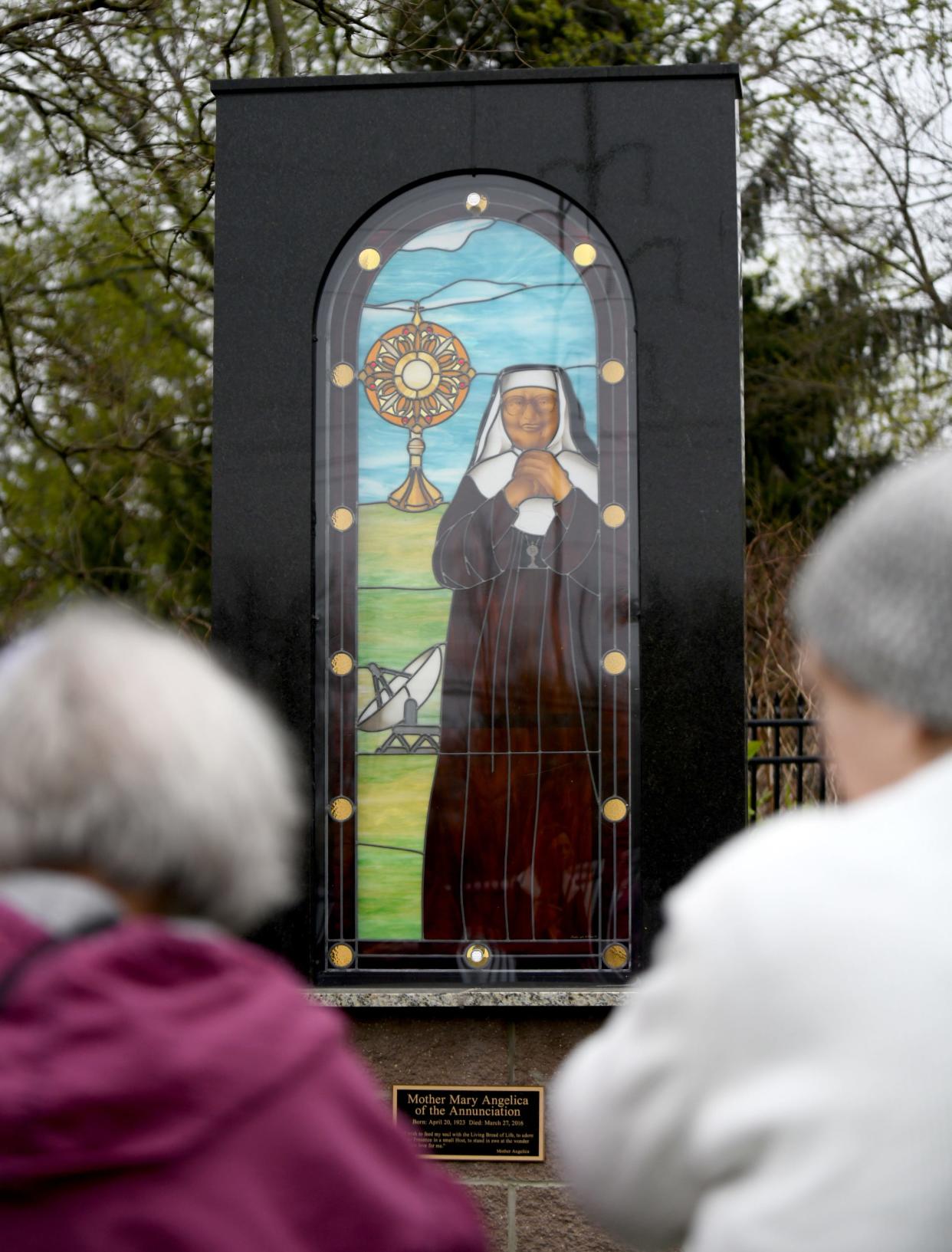 The Rev. Nicholas Mancini celebrates the birthday of Mother Angelica with a Mass and dedication ceremony for a new monument at the St. Raphael Center in Jackson Township.