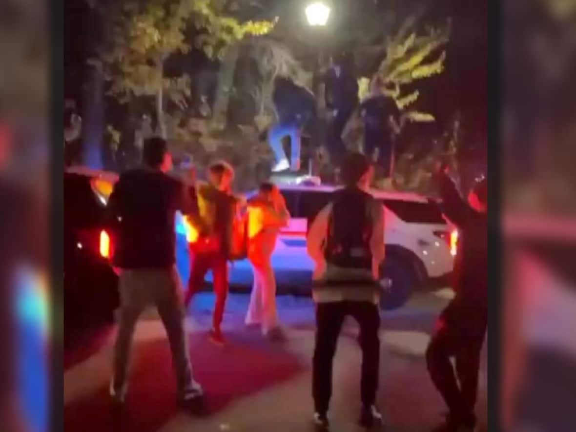 Videos of the Oct. 29 party circulated widely on social media. Some showed people jumping on a police vehicle. Three teenagers and an adult have been charged with mischief in relation to the party. (Jordan Jutiz/Instagram - image credit)