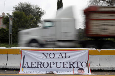 A banner reading "No to the airport" is seen during a protest against the construction of the new Mexico City international airport in Texcoco, Mexico, October 12, 2018. REUTERS/Edgard Garrido