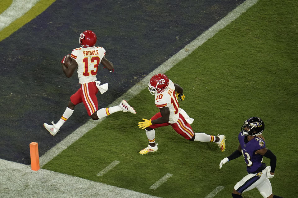 Kansas City Chiefs wide receiver Byron Pringle (13) rushes for a touchdown in the second half of an NFL football game against the Baltimore Ravens, Sunday, Sept. 19, 2021, in Baltimore. (AP Photo/Julio Cortez)