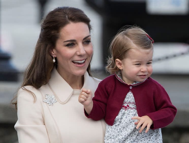 Princess Charlotte, here with her mother, Catherine, duchess of Cambridge, is fueling sales of royal memorabilia. (Photo: Getty Images)