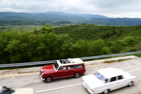 Oldtimer Mercedes cars are seen driving in Imotski, Croatia, May 19, 2019. REUTERS/Antonio Bronic