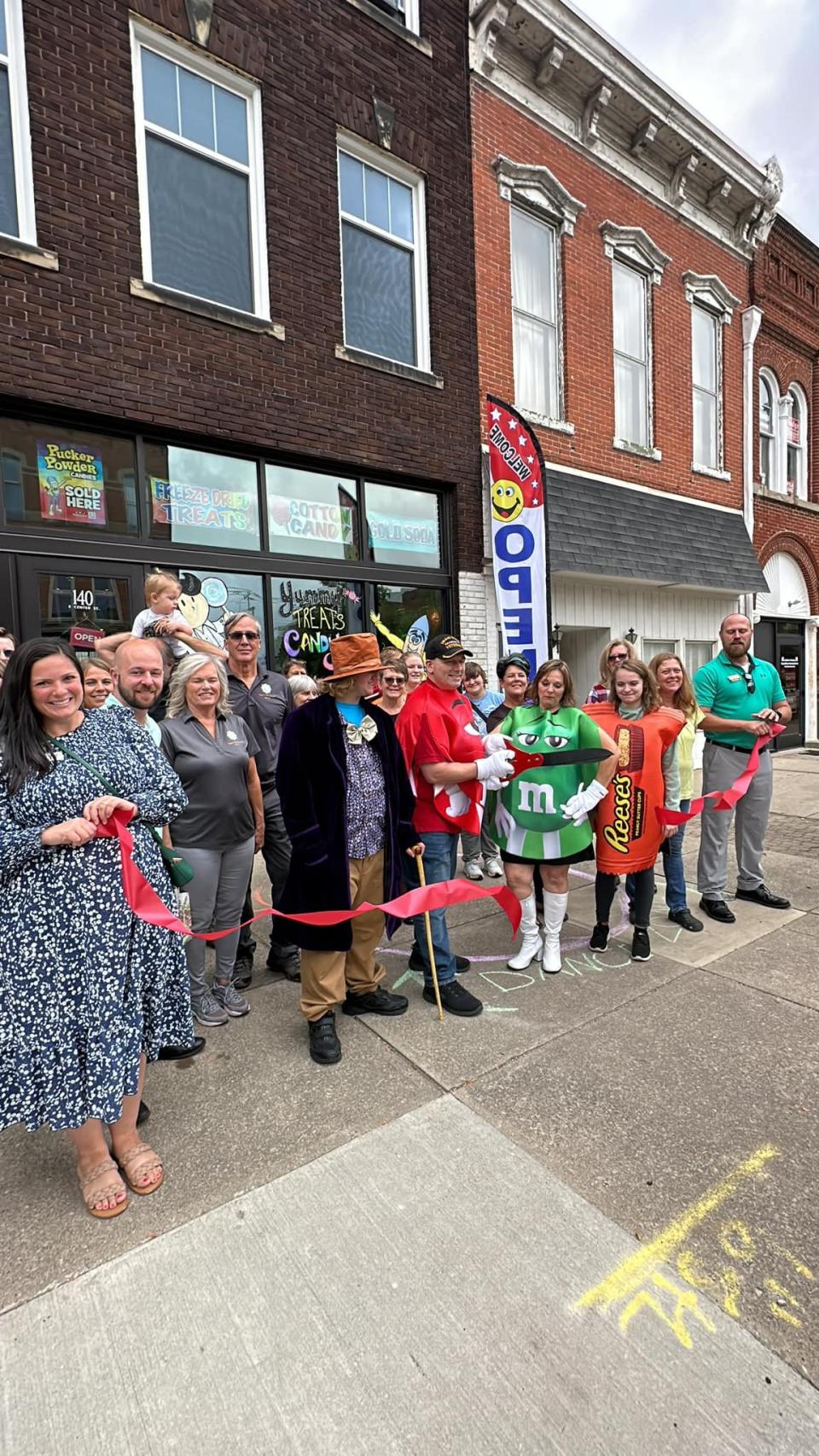 A ribbon-cutting ceremony was held Tuesday to welcome YummY Treats, Candy & MORE to downtown Marion.