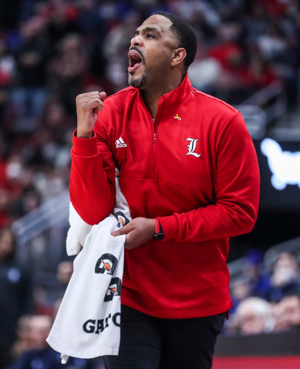 Interim Louisville head coach Mike Pegues yells from the sidelines during the Cards-Blue Devils game. The Cards fell 74-65 to visiting Duke. January 29, 2022