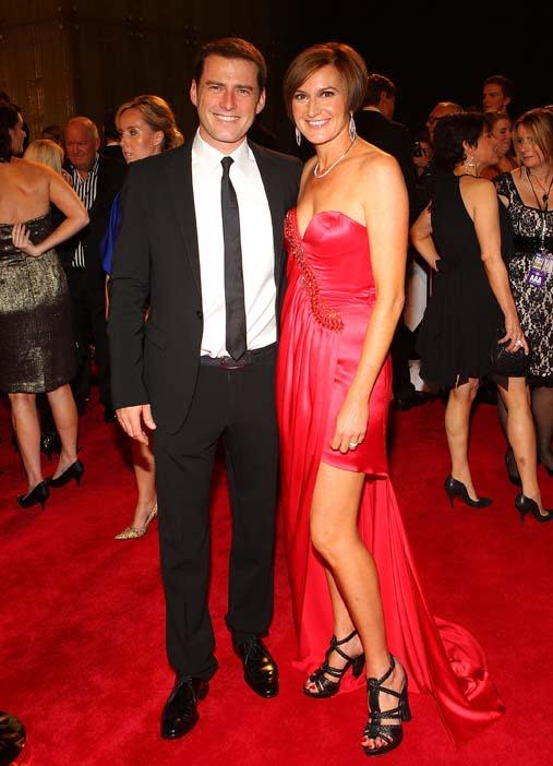 <p>TV personality Karl and his now estranged wife Cassandra Thorburn beamed on the 2011 Logies red carpet.</p>