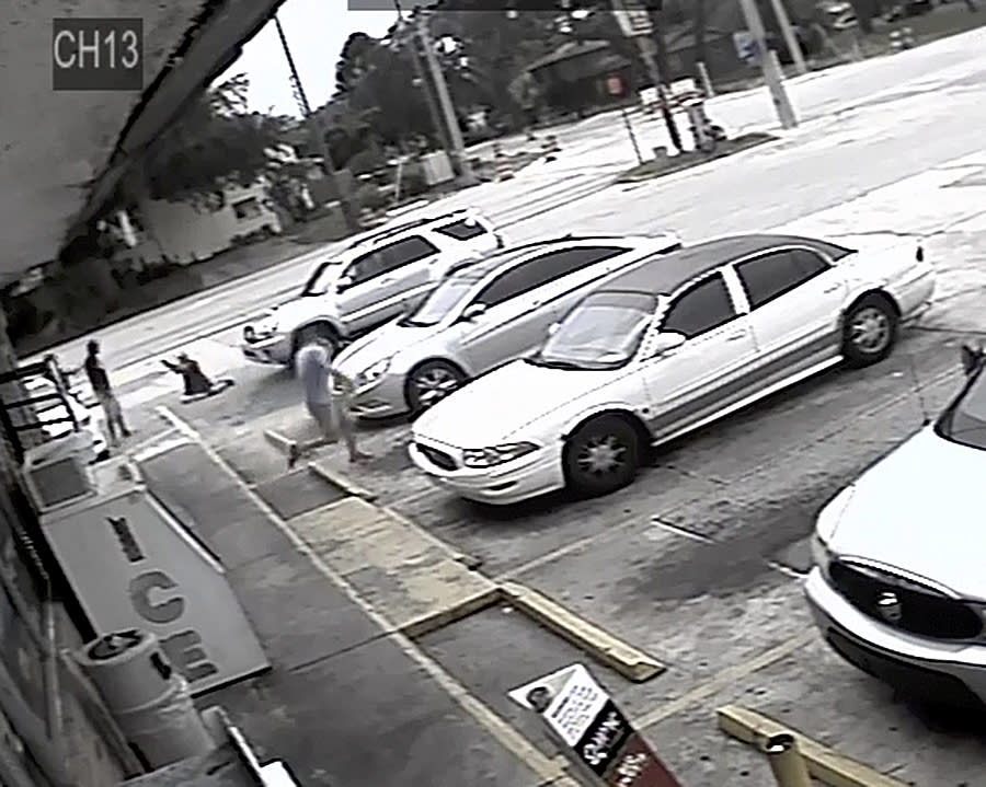 Surveillance video shows Markeis McGlockton, far left, shot by Michael Drejka during an altercation in the parking lot. Source: AP