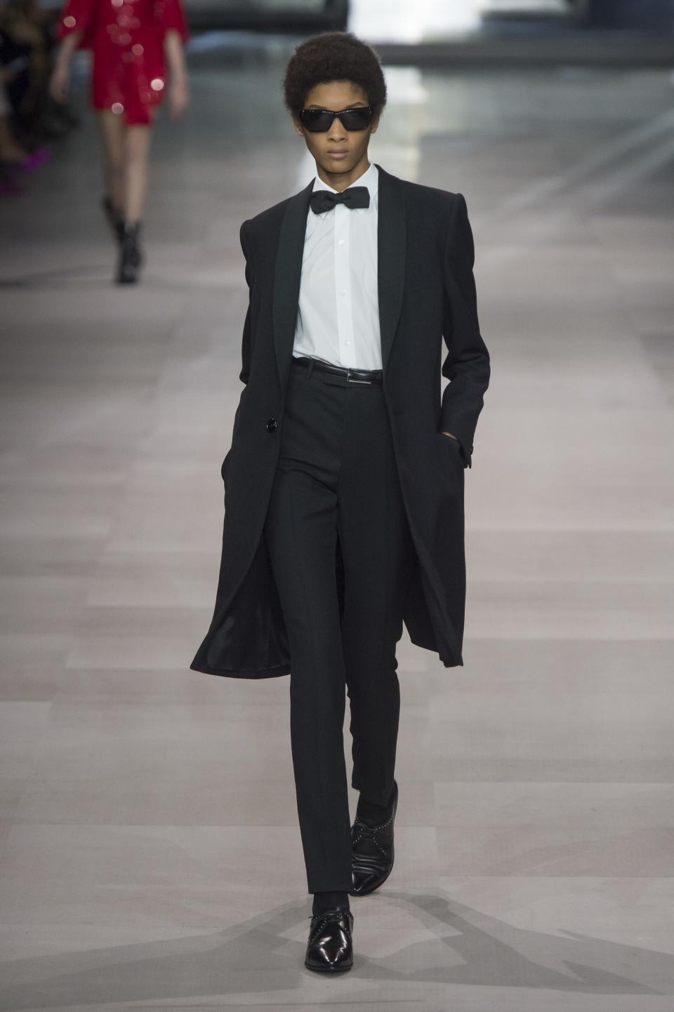 Celine’s Spring 2019 topcoat, crisp white button-down, and bow tie lends itself to a great red carpet heel.