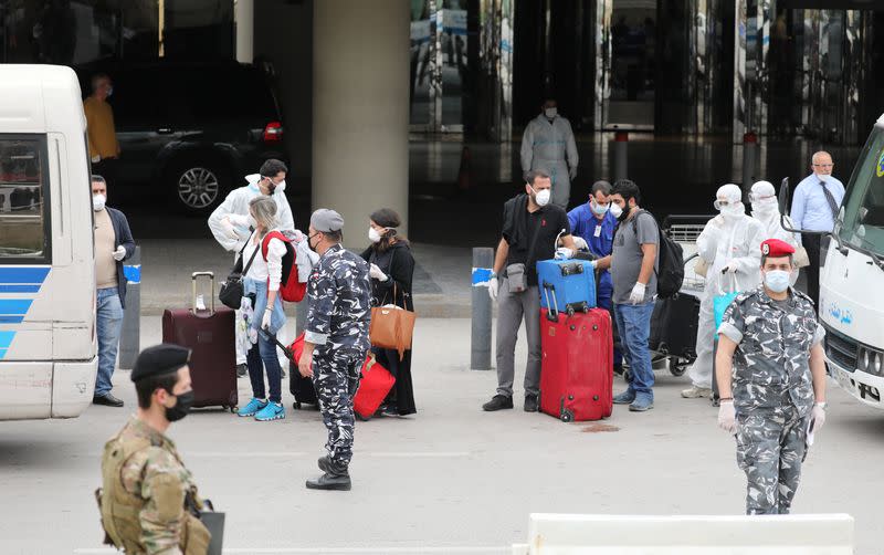 Lebanese people, who were stranded abroad by coronavirus lockdowns arrive at Beirut's international airport