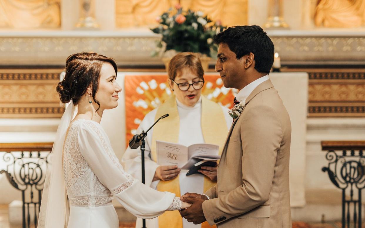 Jann Tipping and Annalan Navaratnam are married by Revd Mia Hilborn at St Thomas' Hospital in London - Rebecca Carpenter Photography