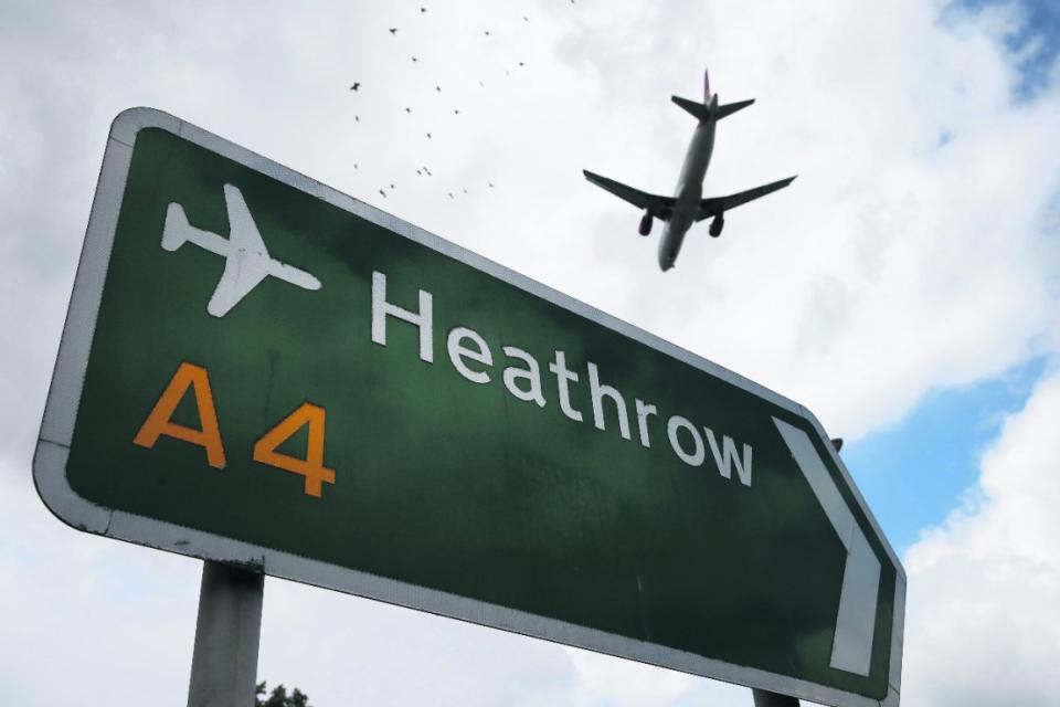 The owner of Stansted is mulling buying up Aberdeen, Glasgow and Southampton Airports. Here an airliner comes in to land at Heathrow Airport (Photo by Peter Macdiarmid/Getty Images)