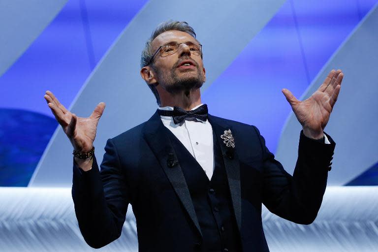 French actor and Master of Ceremony Lambert Wilson on stage at the closing ceremony of the Cannes Film Festival
