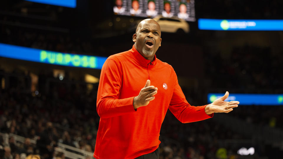 Atlanta Hawks head coach Nate McMillan reacts to a call during the second half of an NBA basketball game against the Milwaukee Bucks, Monday, Jan. 17, 2022, in Atlanta. (AP Photo/Hakim Wright Sr.)