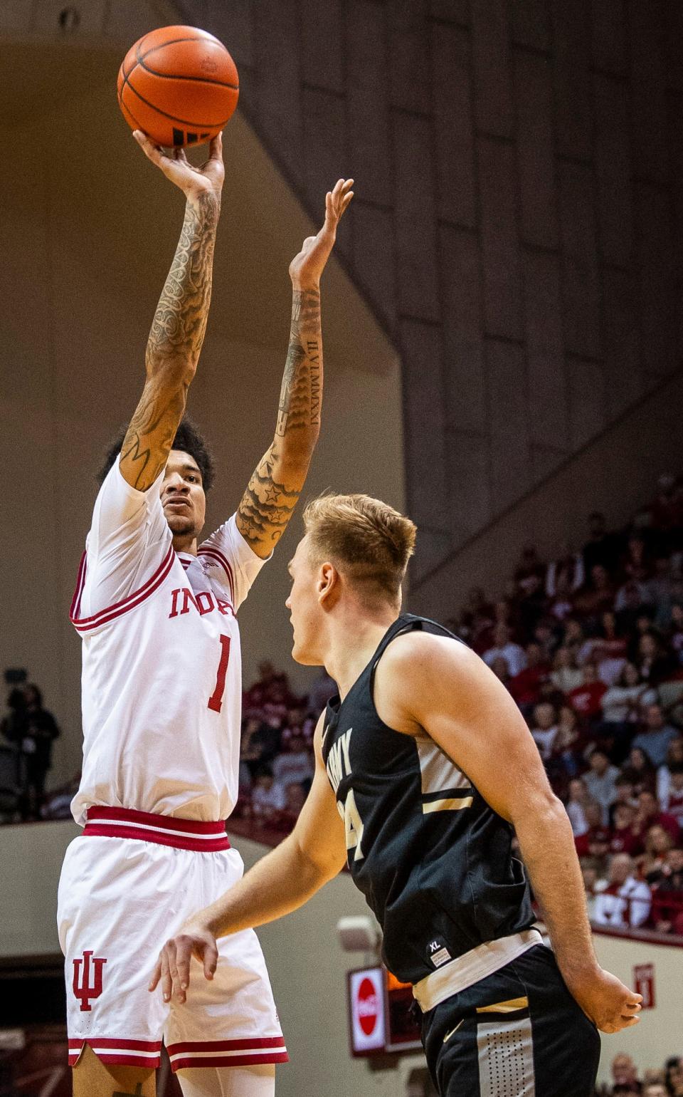 Indiana's Kel'el Ware (1) shoots over Army's Charlie Peterson (34) during the first half of the Indiana versus Army men's basketball game at Simon Skjodt Assembly Hall on Sunday, Nov. 12. 2023.