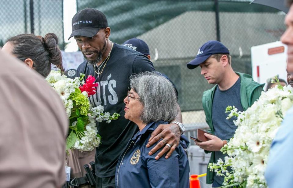 Miamii-Dade County Mayor Daniella Levine Cava and Miami Heat’s Udonis Haslem visited the memorial wall for the missing people in the collapsed Champlain Towers South Condo, located at 8777 Collins Avenue in Surfside, on Wednesday, June 30, 2021.