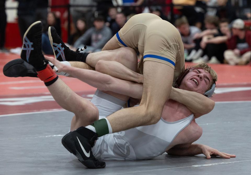 Donovan Catholic's Kurt Wehner (top) pinned St. Peter's Prep's Jake Talarico with an overhead cradle in the Region 6 120-pound final.