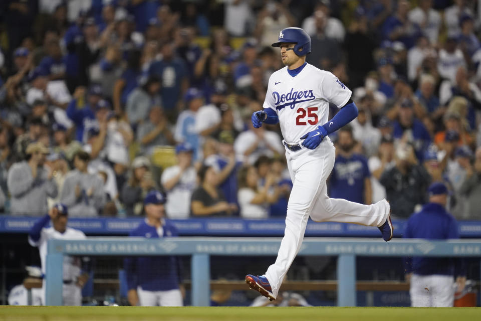 Los Angeles Dodgers designated hitter Trayce Thompson (25) runs the bases after hitting a home run during the third inning of a baseball game against the Colorado Rockies in Los Angeles, Monday, Oct. 3, 2022. (AP Photo/Ashley Landis)