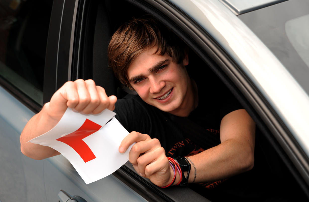 A learner driver rips up his L plate