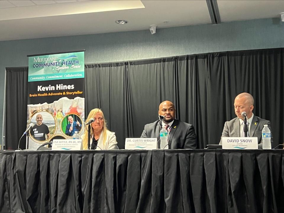 Lissa Suttle, Dr. Curtis Wright and Mayor David Snow serve as panelists at the annual Meridian Community Health Speaker Series at the Holiday Inn in Richmond Wednesday, Sep. 27, 2023. This year's speaker was Kevin Hines and the topic was suicide prevention to recognize September as National Suicide Prevention and Awareness Month.