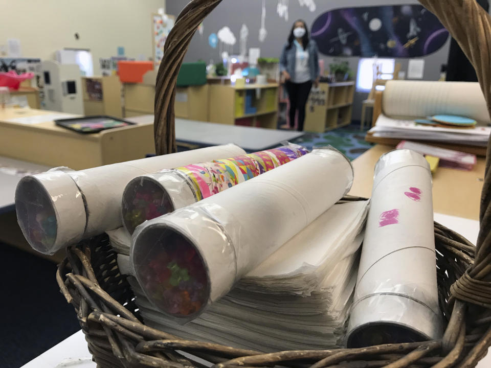 This May 4, 2021 image shows some of the kaleidoscopes made by pre-K students at Cuidando Los Ninos in Albuquerque, N.M. The charity provides housing, child care and financial counseling for mothers, all of whom will benefit from expanded Child Tax Credit payments that will start flowing in July to roughly 39 million households. (AP Photo/Susan Montoya Bryan)