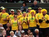 <p>Australian fans encourage Lleyton Hewitt of Australia during his Gentlemen's Singles first round match against Stanislas Wawrinka of Switzerland on day one of the Wimbledon Lawn Tennis Championships at the All England Lawn Tennis and Croquet Club on June 24, 2013 in London, England.</p>