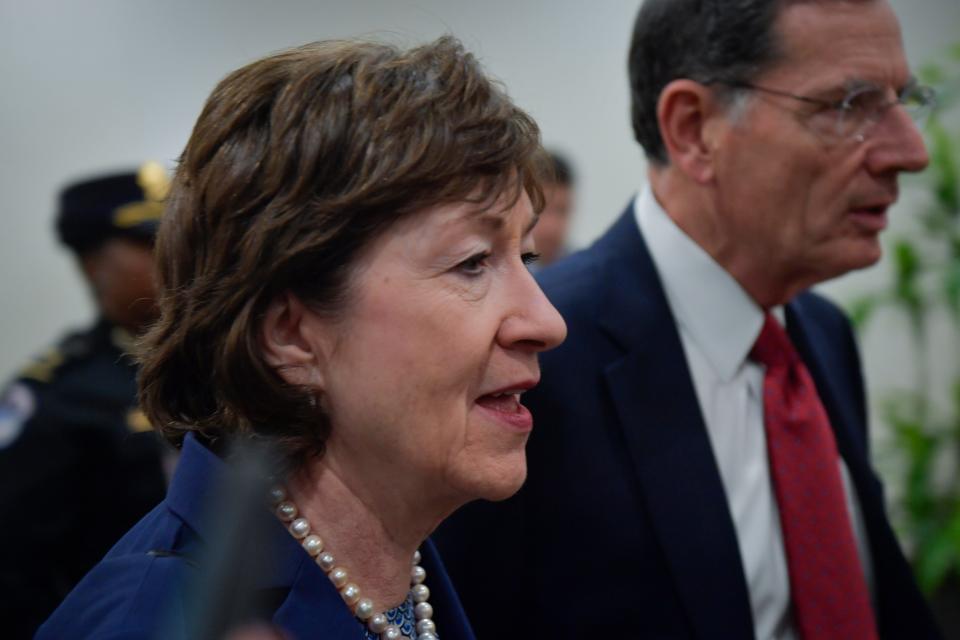 Senator Susan Collins, R-ME, and Senator John Barrasso, R-WY, on their way to the Senate chambers before the Senate acquitted President Donald Trump on two articles of impeachment on Wednesday, February 5, 2020.