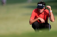 ATLANTA, GA - SEPTEMBER 22: Bubba Watson lines up a putt during the third round of the TOUR Championship by Coca-Cola at East Lake Golf Club on September 22, 2012 in Atlanta, Georgia. (Photo by Sam Greenwood/Getty Images)