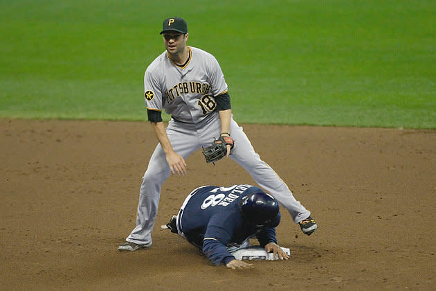 Prince slides in safely with a triple 