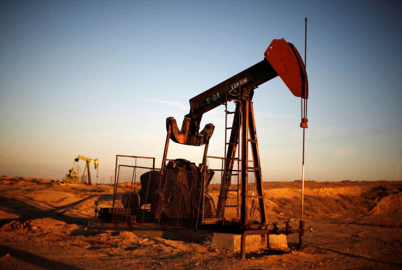 FILE PHOTO: Pump Jacks are seen at sunrise near Bakersfield