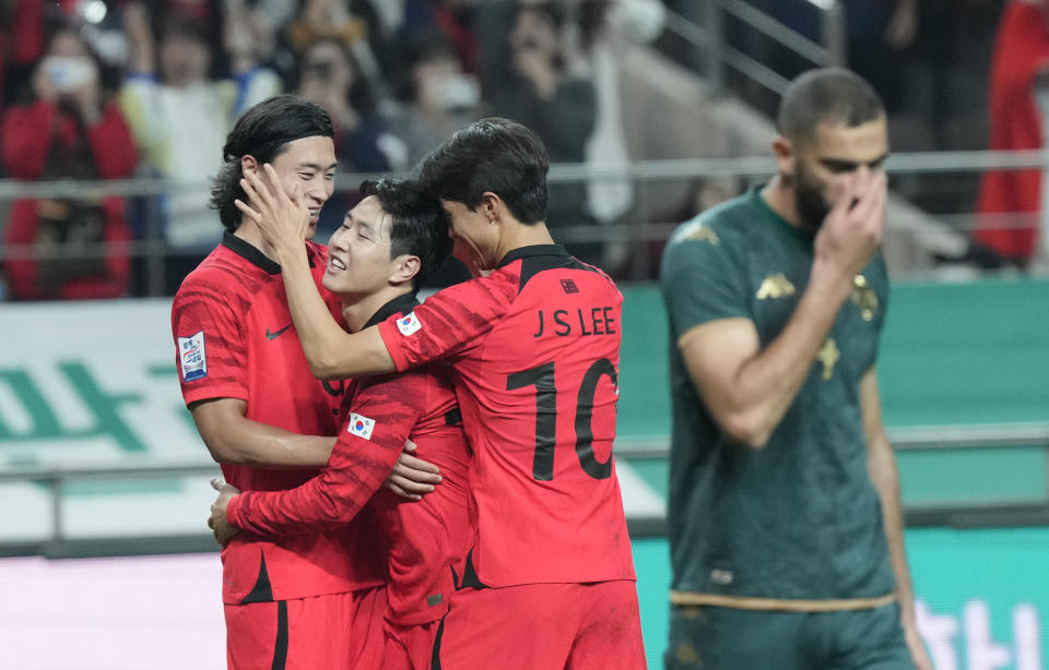 South Korea's Lee Kang-in, second left, celebrates with his teammates after scoring a goal during an international friendly soccer match between South Korea and Tunisia in Seoul, South Korea, Friday, Oct. 13, 2023. (AP Photo/Ahn Young-joon)