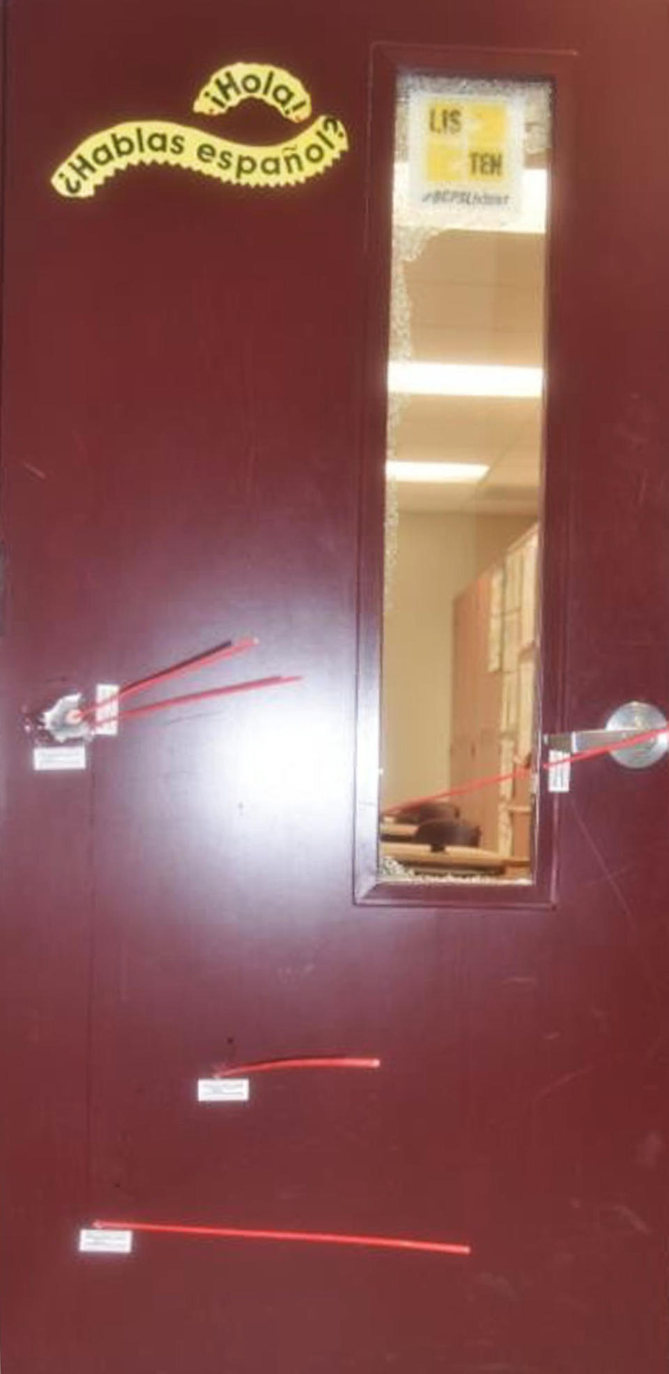 A photo of a classroom door inside Marjory Stoneman Douglas High School, riddled with bullet holes. (Courtesy Max Schachter)