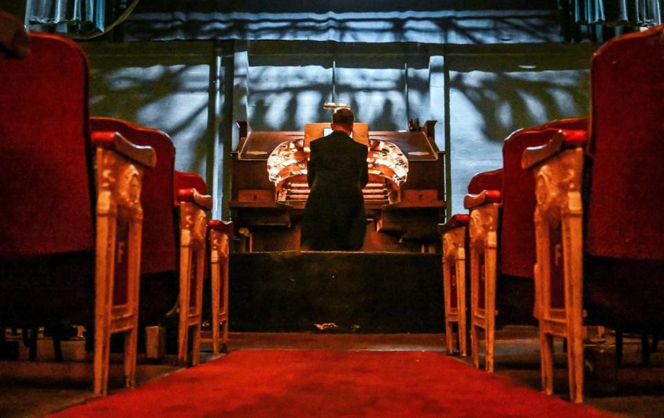 Organist Cactus Harris the Robert Morton theatre pipe organ at the historic Warnors Theatre in Fresno on Tuesday, May 21, 2024.