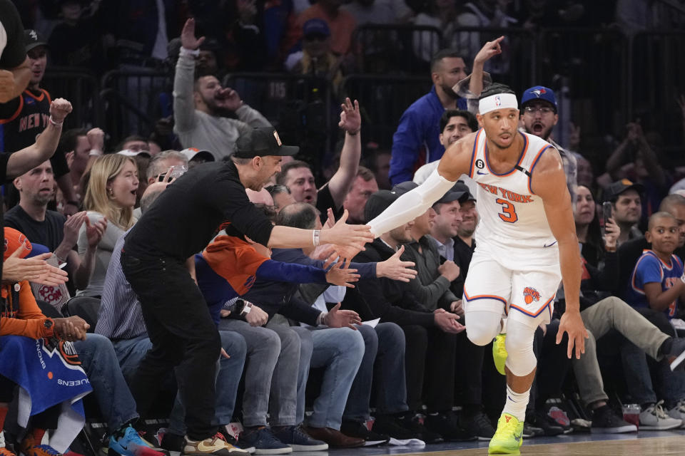 New York Knicks guard Josh Hart reacts after scoring a three-point basket in the first half of Game 4 in an NBA basketball first-round playoff series against the Cleveland Cavaliers, Sunday, April 23, 2023, at Madison Square Garden in New York. (AP Photo/Mary Altaffer)