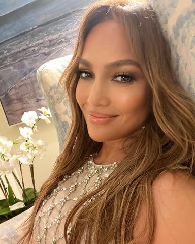 Jennifer Lopez Is Breezy in a Red Maxi Dress and Matching Birkin